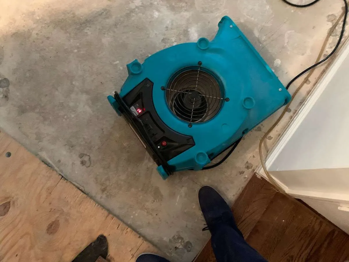 Air mover drying subfloor during Leak Detection & Repair in Rancho Santa Margarita